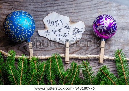 Happy New Year Christmas card on wooden background,horizontal photo