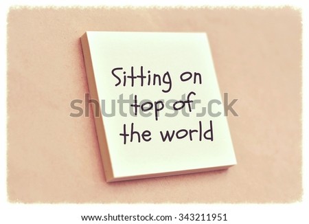 Text sitting on top of the world on the short note texture background