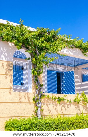 Greece. Greek houses with blue shutters and doors