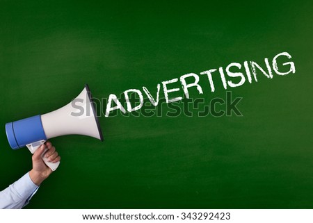 Hand Holding Megaphone with ADVERTISING Announcement