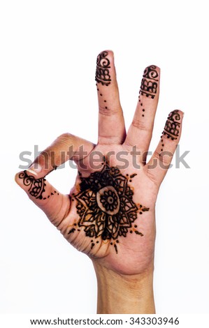 Unique henna tattoo on white background ok sign medallion design