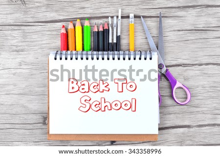 Photo of office and student gear over white background - Back to school concept