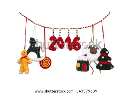 New Year 2016 sign formed with handmade Christmas toys over white background, winter holidays symbol