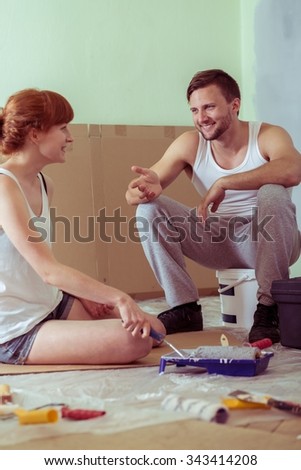 Young couple is happy because of redecoration