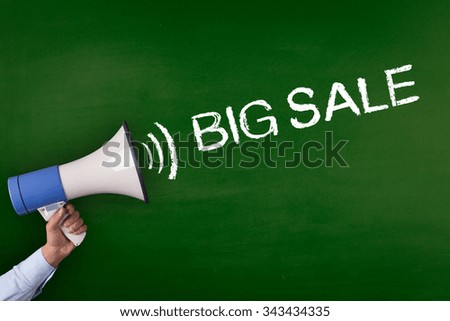 Hand Holding Megaphone with BIG SALE Announcement