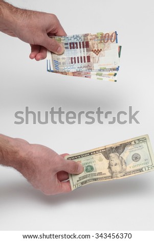 Hand holds american Dollar-bills 