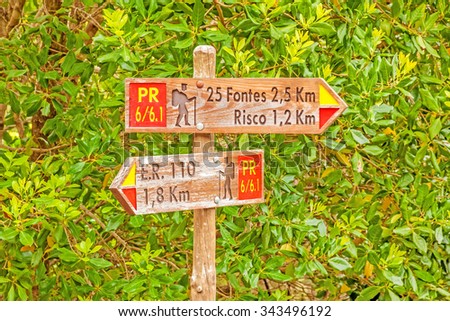 Signpost showing the way to 25 Fontes and Risco, famous walk trail for hikers on island of Madeira.