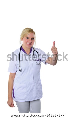 Friendly smiling female doctor with stethoscope giving a thumbs up isolated on white background