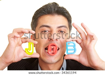 Businessman holding the letters J, O, B in his hands
