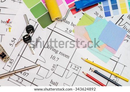 Architectural drawing with color samples, brush, clock, calculator