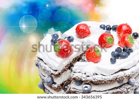 Birthday fruit cake with fruits close up