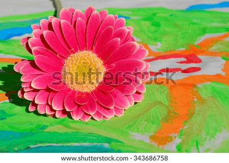 Detail of gerber daisy on a colorful child painting ,gift for Mothers day or birthday present
