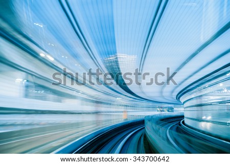 tunnel in tokyo at night blurred as idea of speed Royalty-Free Stock Photo #343700642