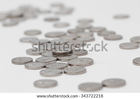 A pile of coins, isolated on a white background (Israeli money)