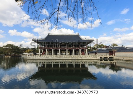 The korean traditional garden(building, house) with pond(water), reflection, 'Gyeonghoeru' at the korean royal palace(Gyeongbokgung) in the blue sky, seoul at the fall(autumn, october, september)