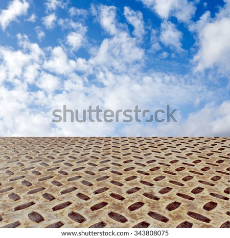 blue sky and metallic floor, industrial background