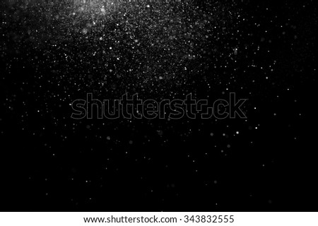 abstract splashes of water on a black background.