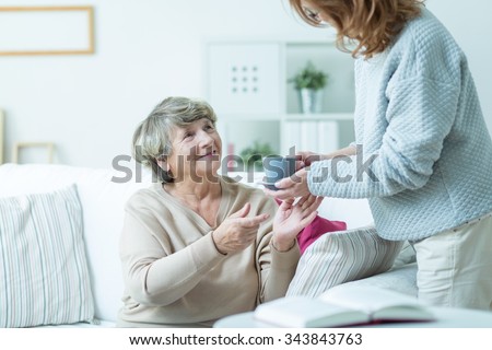 Picture of daughter caring about elder mother