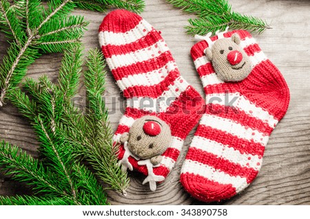 Christmas card,Christmas decoration, socks and toys on a rustic wooden background,horizontal photo