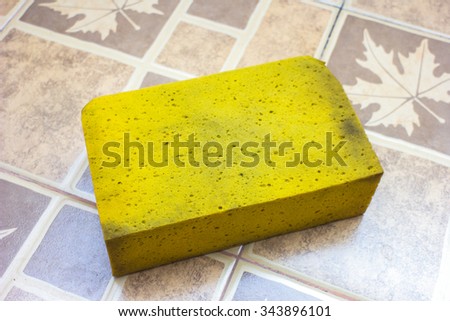 A yellow sponge close up