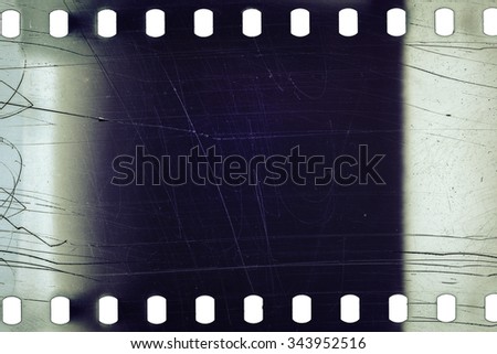Blank noisy scratched film strip texture background 