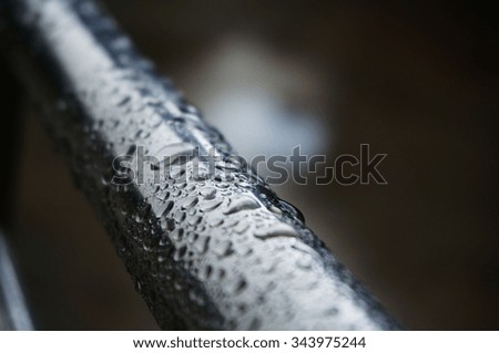 closeup rain drops on metal after raining