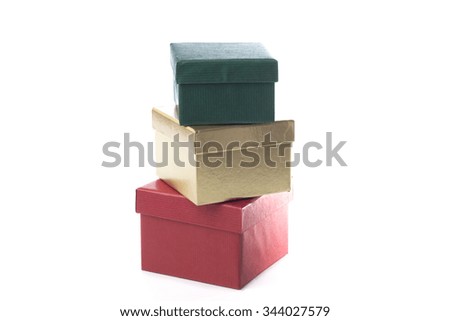 Green, gold and red giftboxes, isolated on white background