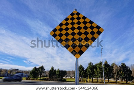 Checkerboard Traffic Symbol, alert motorists to the end of the road or a possible sharp turn ahead. 