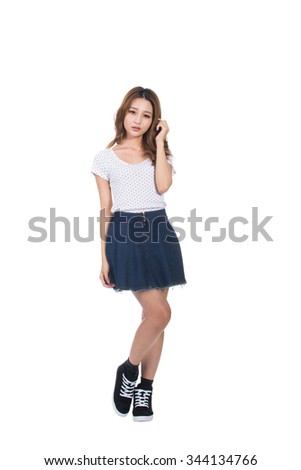 Young Asian girl, full length portrait isolated.