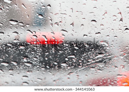 Auto glass droplets in the rain.background and texures.