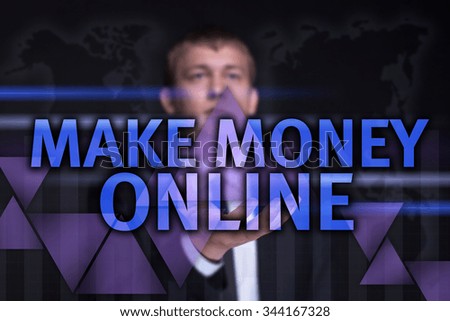 Businessman holding on the right hand a glowing blue text "Make Money ONLINE". Business concept. Internet concept