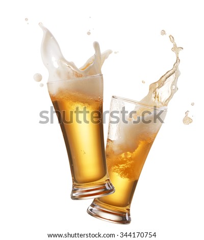 two glasses of beer toasting creating splash Royalty-Free Stock Photo #344170754