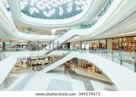 abstract ceiling and escalator in hall of shopping mall Royalty-Free Stock Photo #344179673