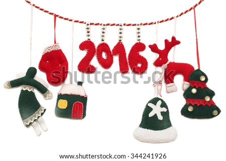 New Year 2016 sign formed with handmade Christmas toys over white background, winter holidays symbol