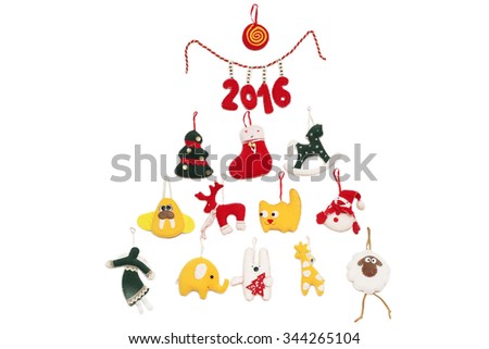 New Year Tree with 2016 sign formed with handmade Christmas toys over white background, winter holidays symbol