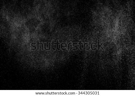 abstract splashes of water on a black background.