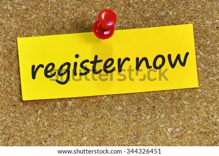 register now word on yellow notepaper with cork background.