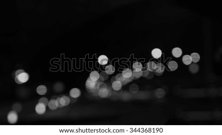 blur abstract bokeh of street city night light background,abstract traffic background,,black and white tone