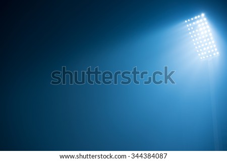soccer stadium lights reflectors against black background Royalty-Free Stock Photo #344384087