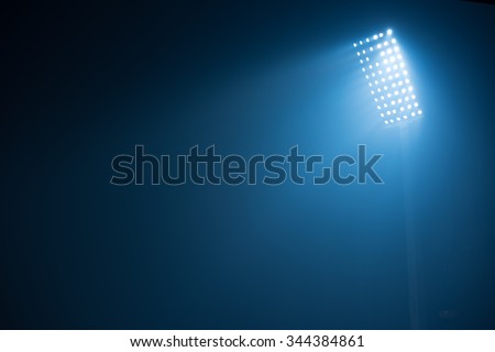 soccer stadium lights reflectors against black background Royalty-Free Stock Photo #344384861