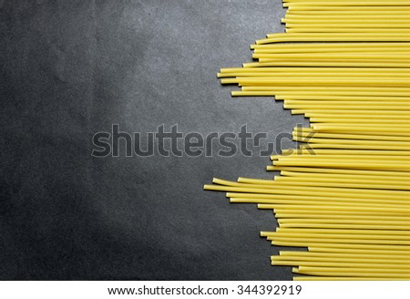 long spaghetti as stock chart on black background