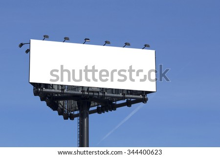 Blank billboard for advertisement, against blue sky