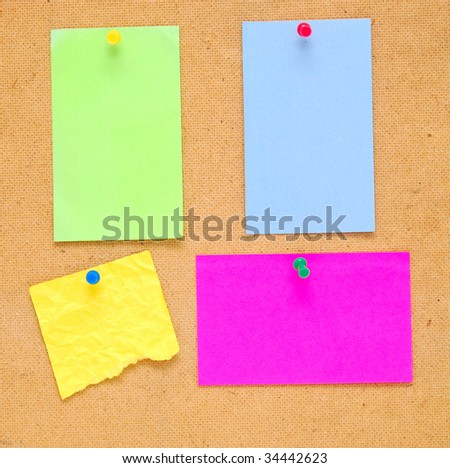 empty color notes on wooden background