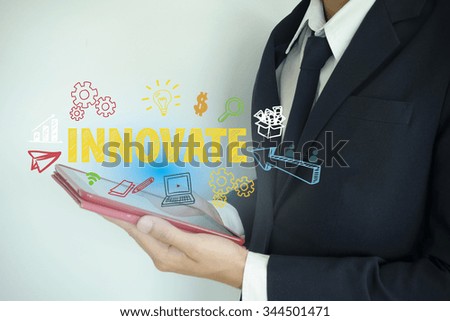 businessman show innovate over tablet , business concept , business idea