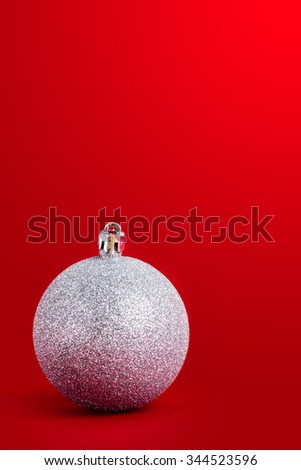 Silver Christmas balls with red background