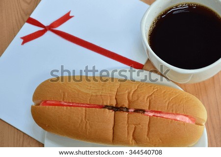 hot dog bread filled strawberry cream raisin and black coffee