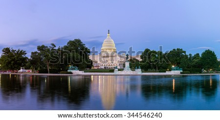 Panorama of the United States Capitol, seen from the the Capitol Reflecting Pool, Washington DC, USA.