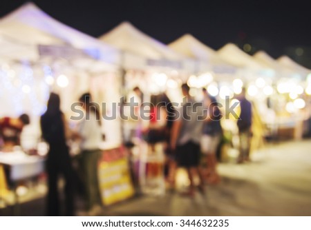 Abstract blurred lights of night market