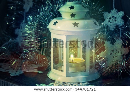 Christmas decor: candle in white candle holder with flare and texture