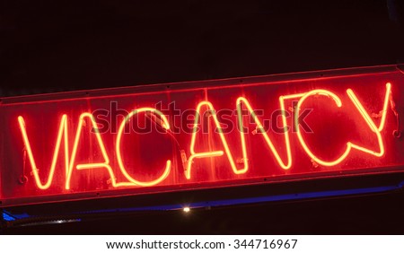 red neon vacancy sign for motel.